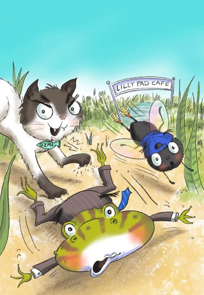 A cat and two frogs are in the sand.